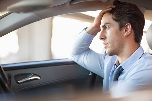 businessman-driving-car-gm